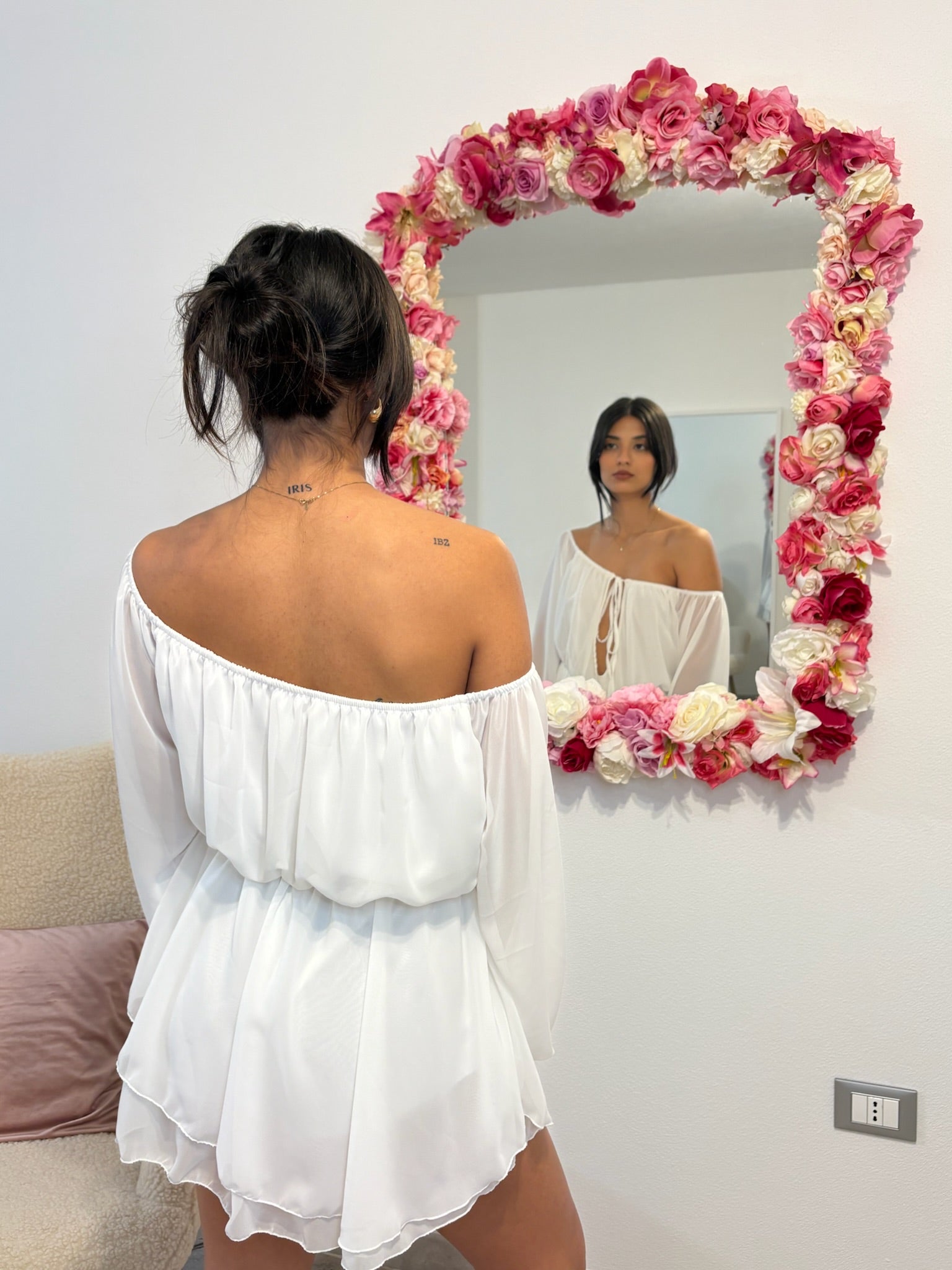 Tutina a spalle scoperte